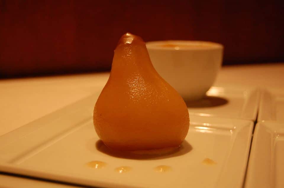 a peeled and steamed pear stuffed with honey and dates