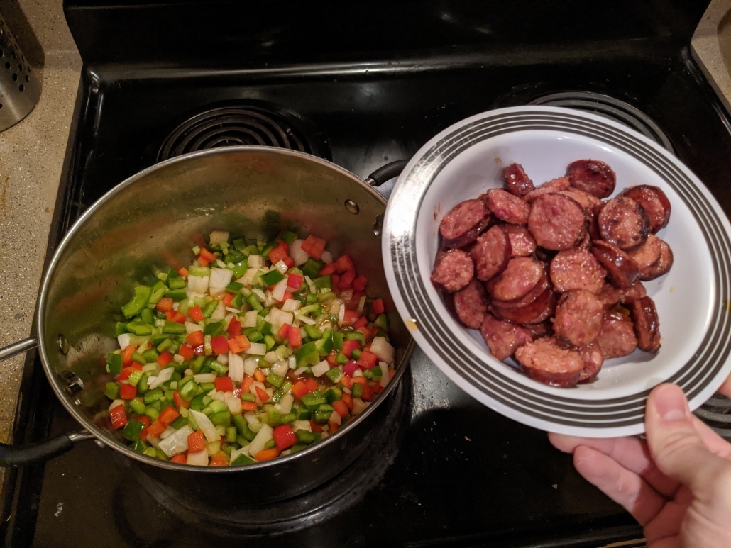 Cooked andouille sausage. Onions, bell peppers, and celery will start the base of the jambalaya.