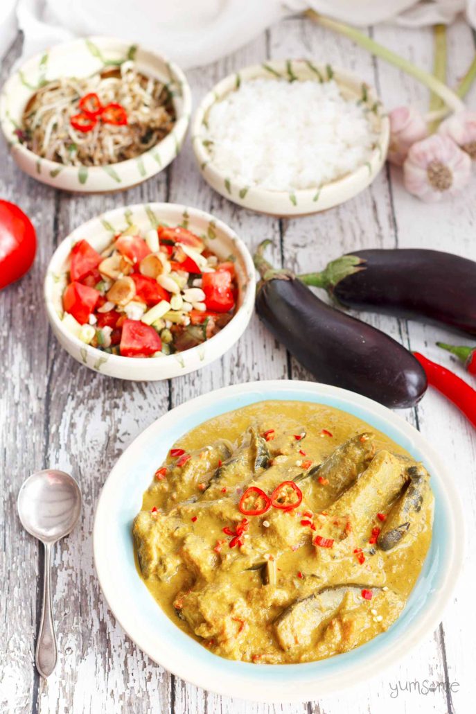 A creamy yellow curry filled with eggplant