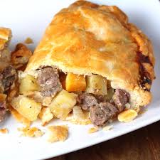 A pasty with sirloin, onion, and rutabaga inside