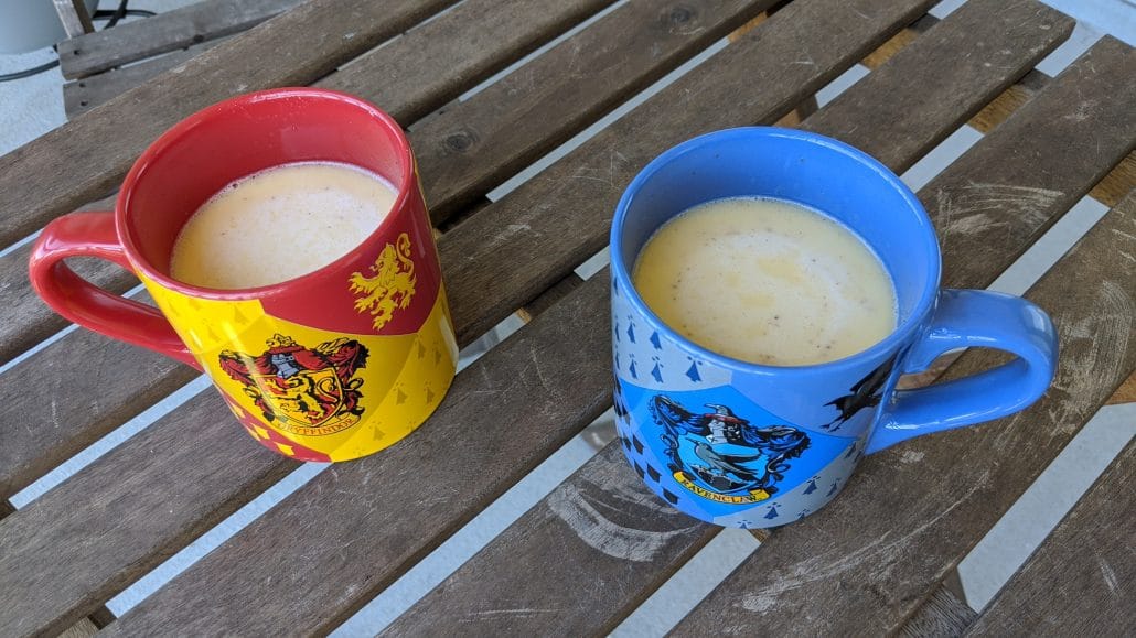 Hot butterbeer in Gryffindor and Ravenclaw coffee mugs