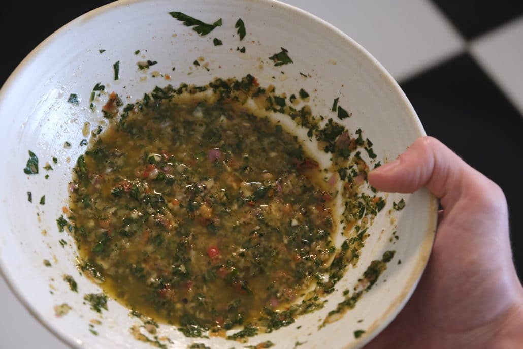 A bowl of chimichurri sauce