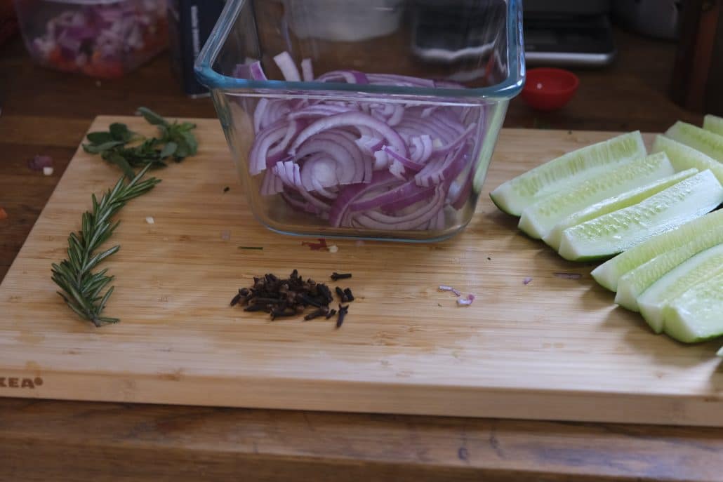 Cucumbers and red onions waiting to be pickled
